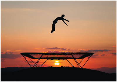person jumping on trampoline